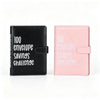 A black and pink premium PU leather savings planner binder with the text 100 envelope savings challenge.