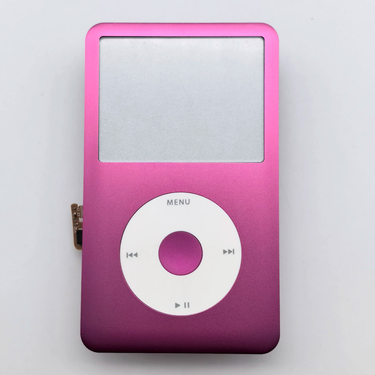 A pink iPod Classic front faceplate with a circular menu button visible.