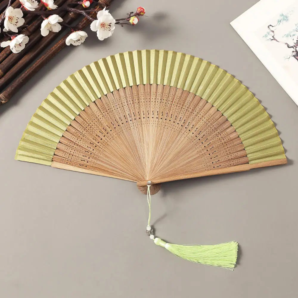 Traditional Bamboo Folding Fan with Solid Color Design