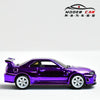 A diecast model of a Nissan GTR R34 in a vibrant purple electroplated finish.