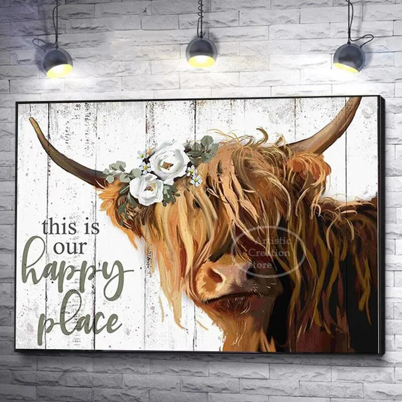 A close-up painting of a Highland cow's head with horns and flowers, featuring the text This is our happy place.