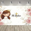 A soft pink and white First Communion backdrop featuring a girl, a cross, and floral designs.