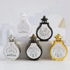 Three elegant lanterns featuring star and moon designs in silver, black, and gold finishes.