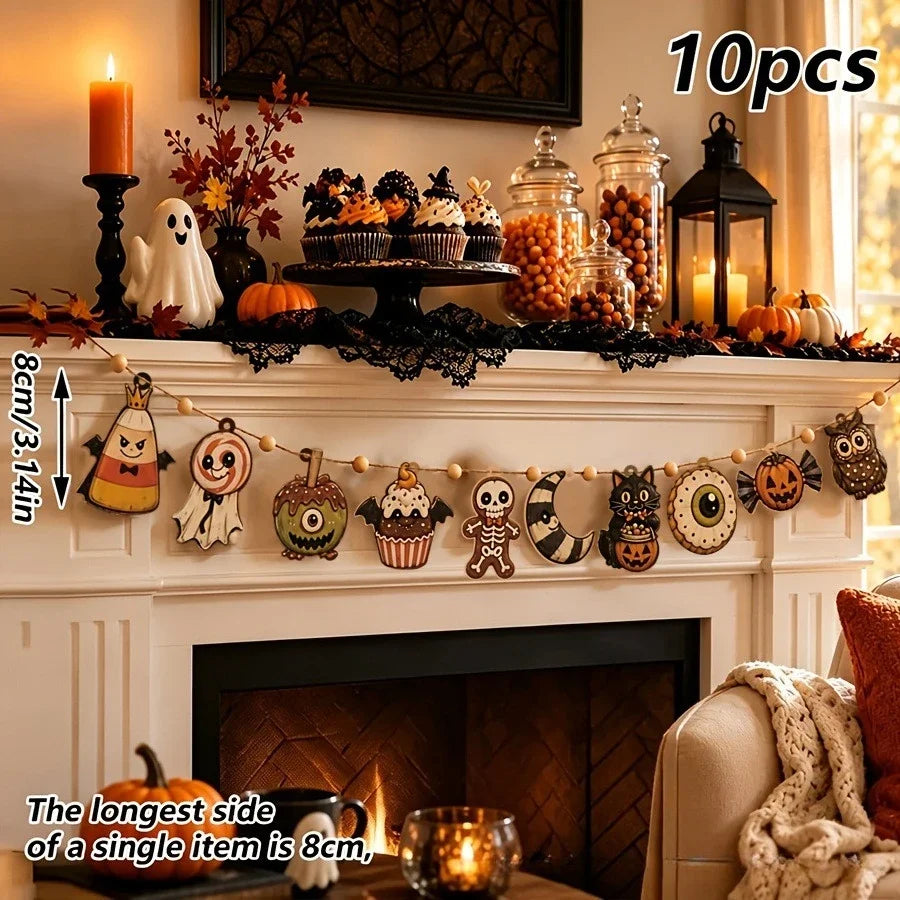 Vintage Halloween wooden hanging garland featuring retro pumpkin, ghost, and cat beads displayed on a fireplace mantel.