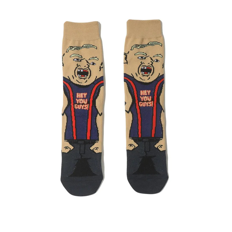 A pair of novelty crew socks featuring a cartoon face with an angry expression and text on the leg.
