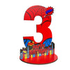 A red wooden number three sign with a spider design and birthday text on a circular base.