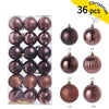 A set of 36 festive Christmas baubles in various shades of rose gold and bronze for holiday decoration.