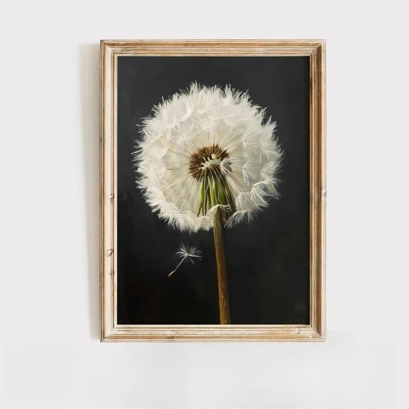 A framed painting featuring a white dandelion seed head against a dark background.