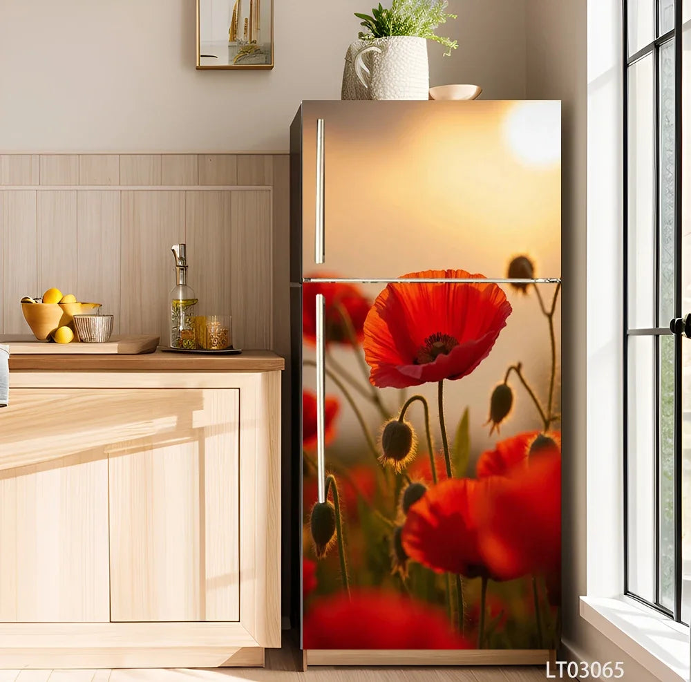 A refrigerator featuring a floral design decal with red poppies and yellow accents.