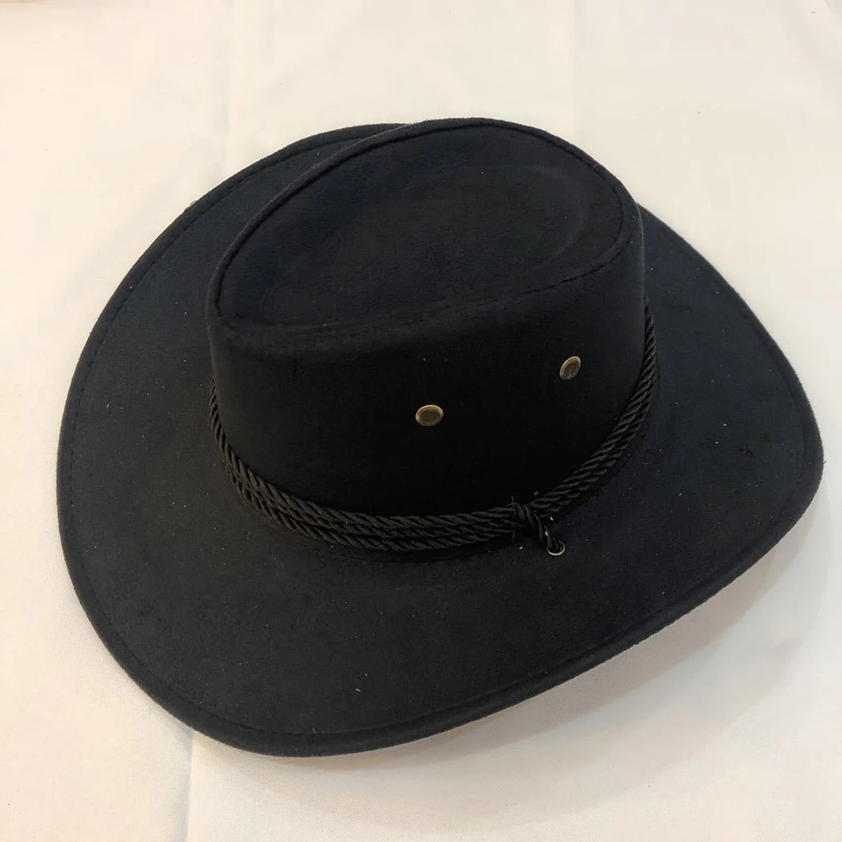 A black classic western cowboy hat with a wide brim and an adjustable drawstring.