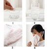 Four images showing compressed camping towels being used for cleaning or wiping.