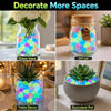 Various glass and ceramic jars filled with glow-in-the-dark luminous pebbles used for home and garden decor