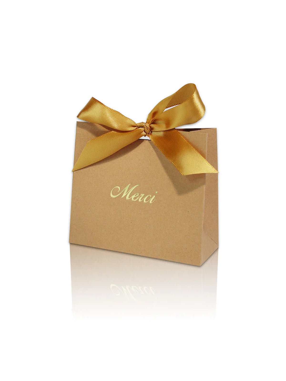 A brown paperboard gift box tied with a gold ribbon, featuring the word Merci printed on the top.
