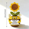 Hand crocheted sunflower bee potted ornament with yellow petals and green leaves