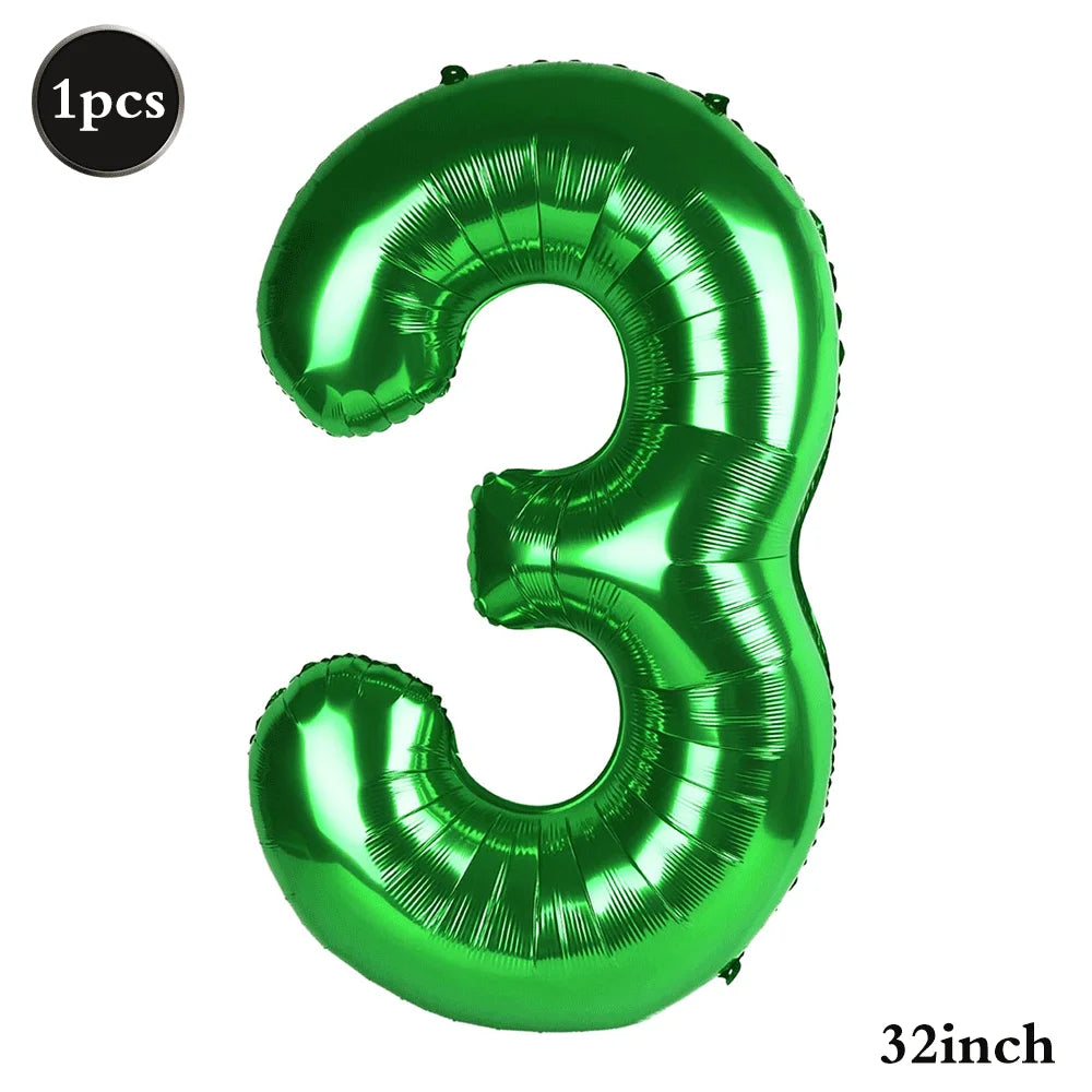 A shiny green foil number balloon shaped like the number three, measuring 32 inches.