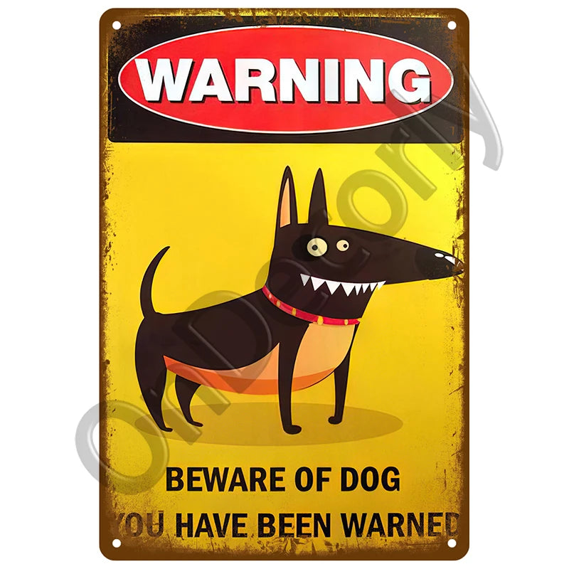 A vintage metal sign with a yellow background and red warning banner featuring a silhouette of a black dog.
