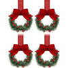Set of four mini Christmas wreaths with red ribbon bows and red berries