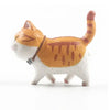 A small, white and orange 3D cartoon cat figurine with an orange body and white paws.