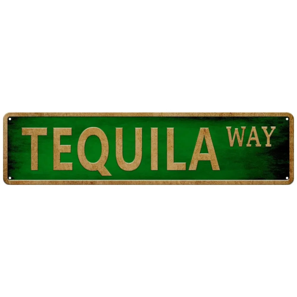 A rectangular green metal tin sign with the text TEQUILA WAY in gold lettering.