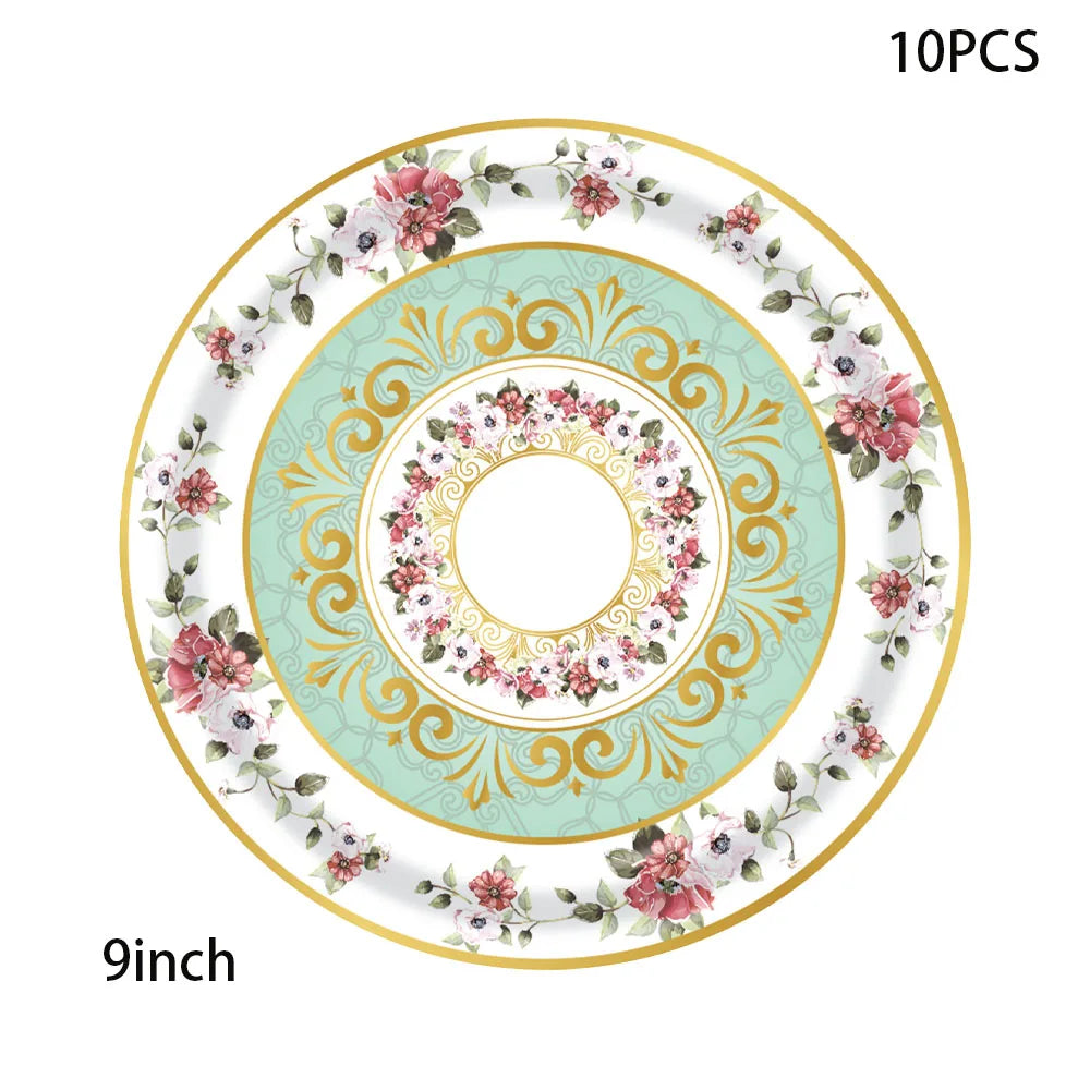 A gold-rimmed vintage floral paper tableware set featuring a centerpiece design with pink and green accents.