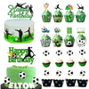 A set of soccer ball cake toppers and cupcakes for a birthday party featuring green and black colors.