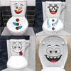 Funny cartoon face toilet decal showing various expressive faces on a white toilet bowl and tank.