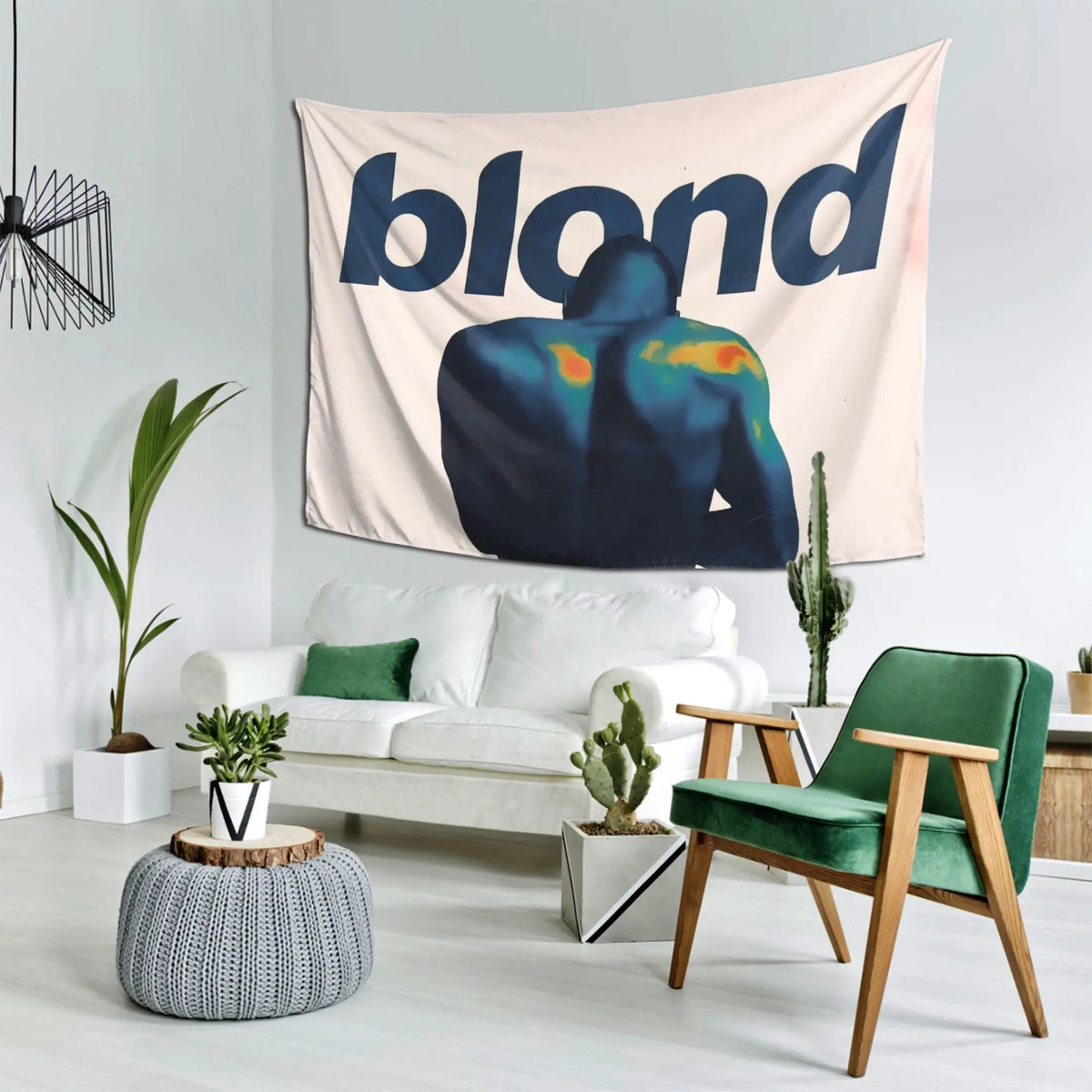 A large tapestry featuring a blue silhouette of a person against a light background.
