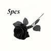 Five artificial black roses with leaves on a stem for home decor