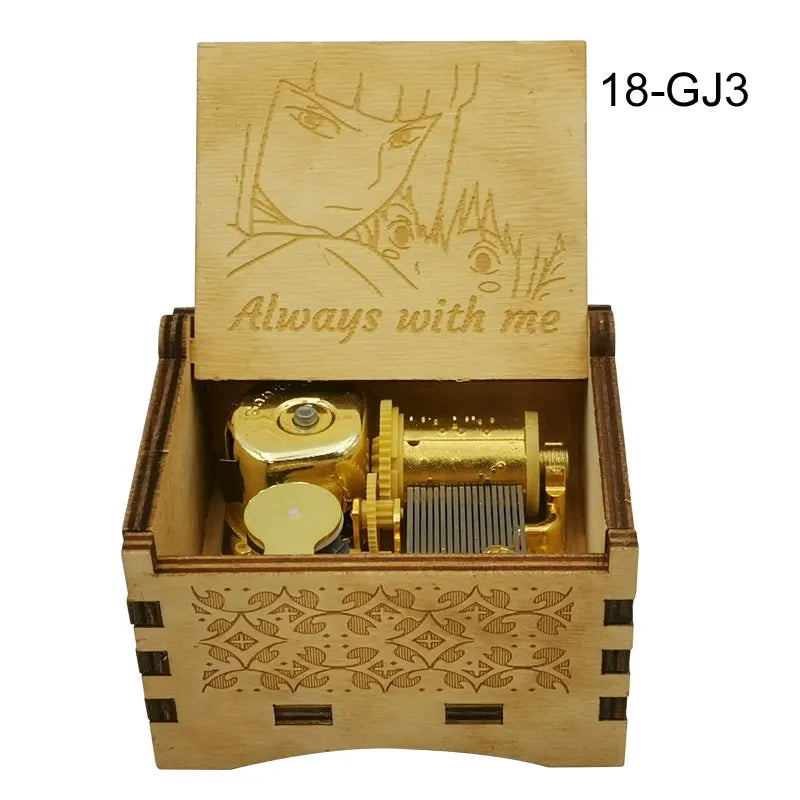 A wooden music box with a lid featuring an anime character and a golden mechanism inside.