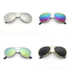 A set of classic pilot sunglasses shown in three color variations: silver, iridescent blue/green, and black.
