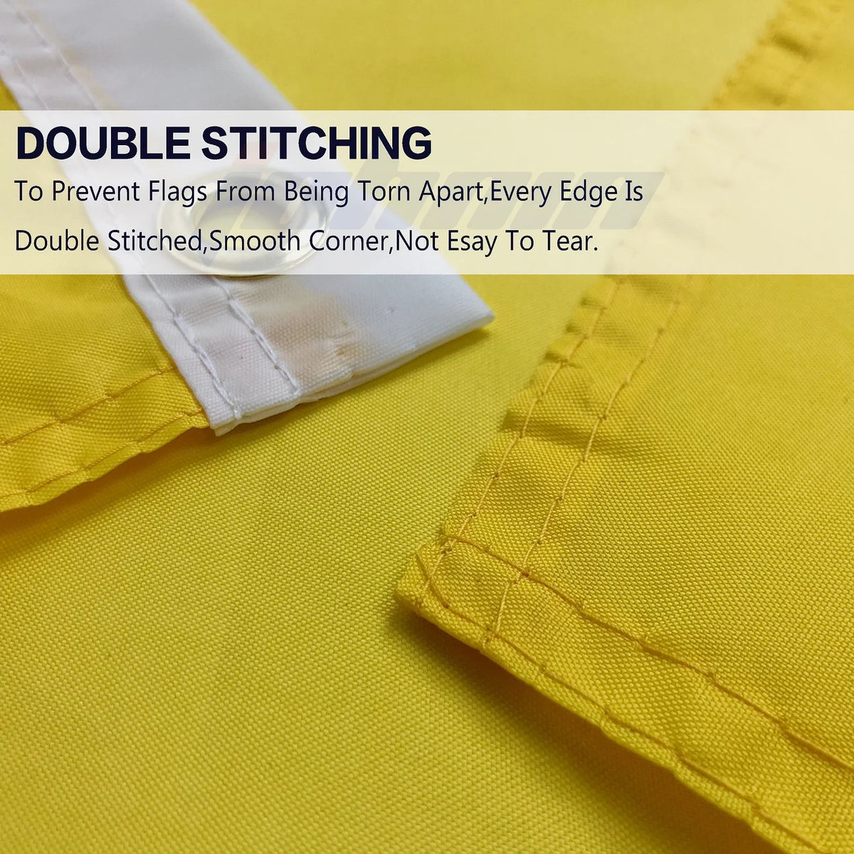 Close-up of a yellow fabric with double stitching on a white edge, demonstrating durable sewing.