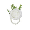 Elegant wrist corsage bracelet featuring white roses and green foliage for weddings