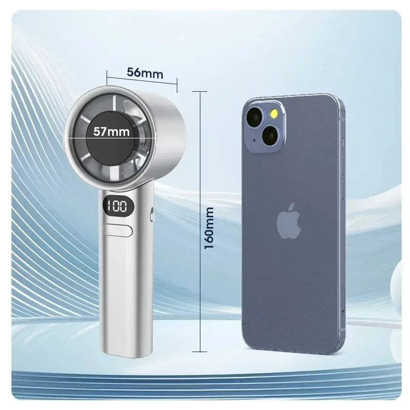 A silver handheld cooling fan with a lens and power indicator is shown next to a smartphone.
