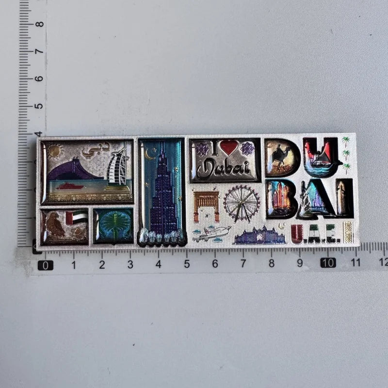 A collection of wooden fridge magnets featuring various destinations including Dubai and the United Arab Emirates.