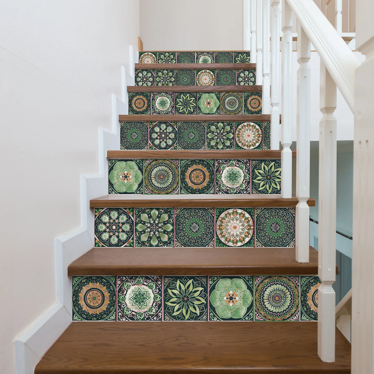 A staircase with decorative tile accents featuring green and beige patterns on the risers and treads.