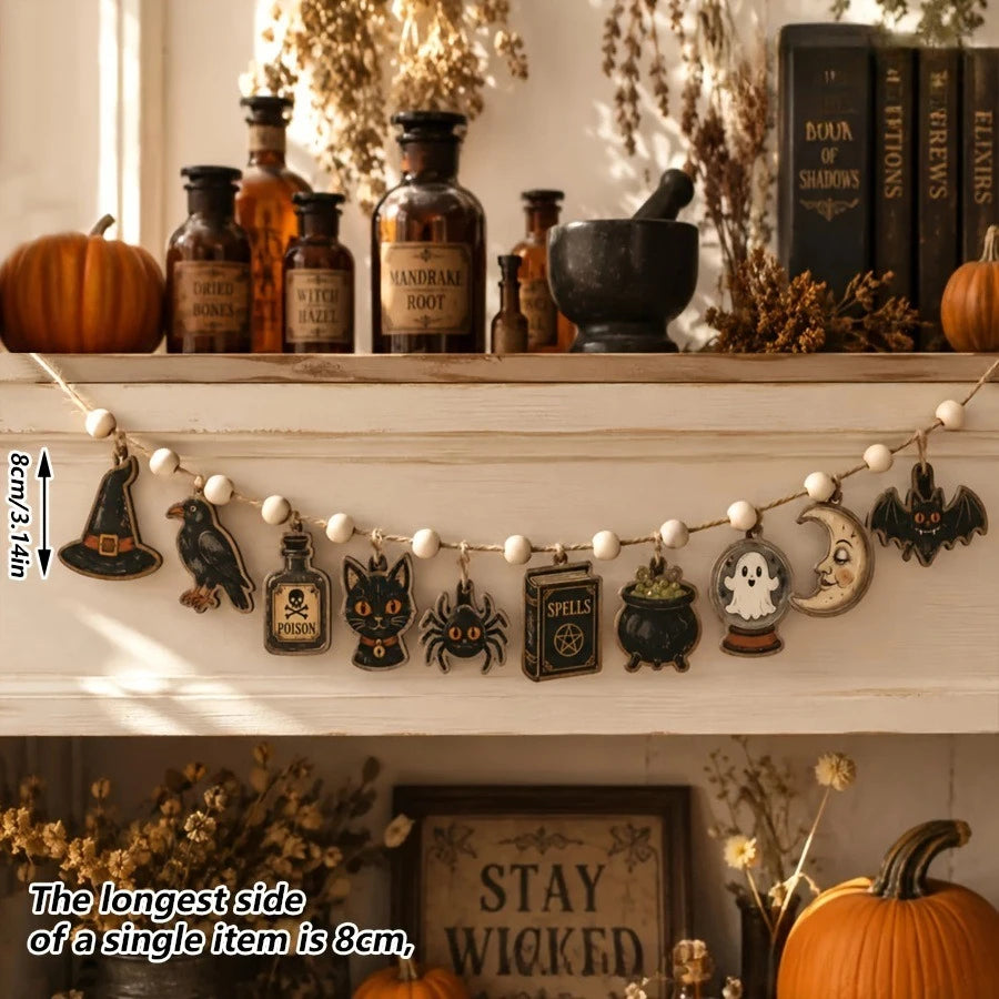 Vintage Halloween wooden hanging garland featuring retro pumpkin, ghost, and cat beads displayed on a shelf.
