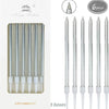 A set of six metallic birthday cake candles with holders shown in a vertical arrangement.