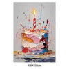 A vibrant, colorful birthday cake with lit candle and paint splatters on a white background.