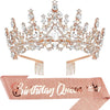 A sparkling gold and clear rhinestone tiara crown set with a rose gold sash for a birthday queen theme.