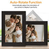A black digital photo frame displaying a family portrait, demonstrating the auto-rotate function.