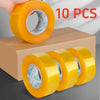 Ten rolls of yellow heavy-duty transparent packing tape for box sealing