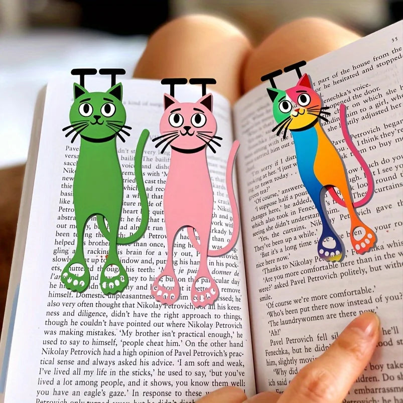 A set of decorative acrylic cat bookmarks featuring various cats in green, pink, and orange colors.