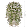 A dense arrangement of white and pale pink silk morning glory vine hanging flowers for home decor.