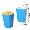 A blue disposable paper cup filled with yellow popcorn, shown next to a dimensioned view.