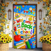 A colorful vinyl backdrop banner featuring a 'Welcome Back to School' design with apples and books.
