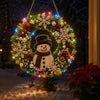 An LED-illuminated diamond painting wreath kit featuring a circular Christmas wreath decorated with red, green, and white ele