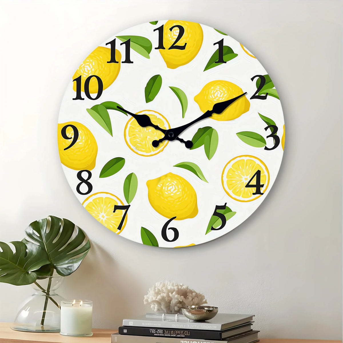 A round wall clock face decorated with yellow lemons and green leaves, featuring numbers 1 through 12.