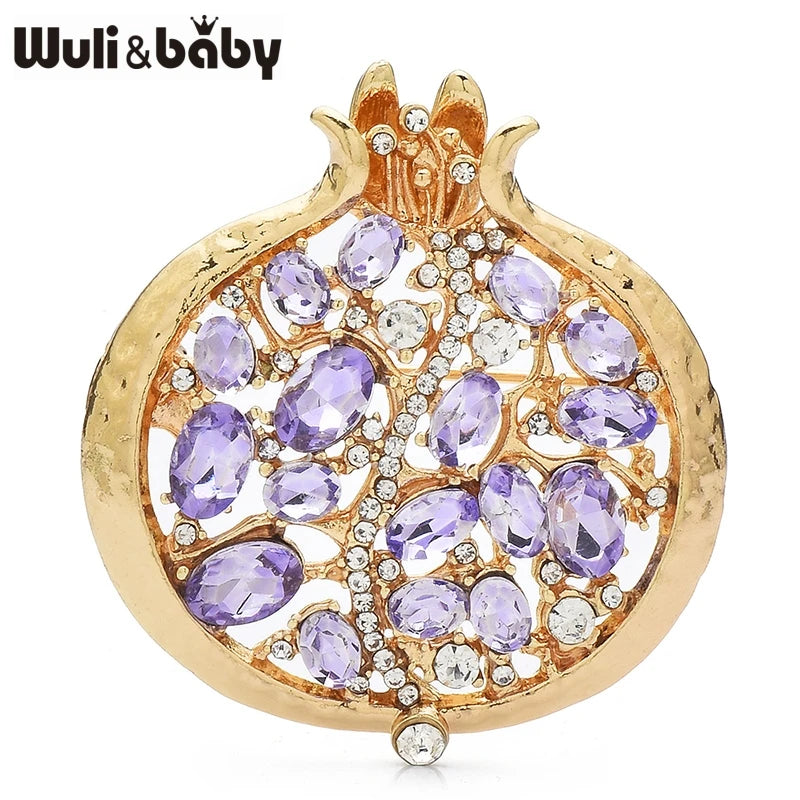 Gold crystal pomegranate brooch pin featuring purple gemstones and clear diamonds