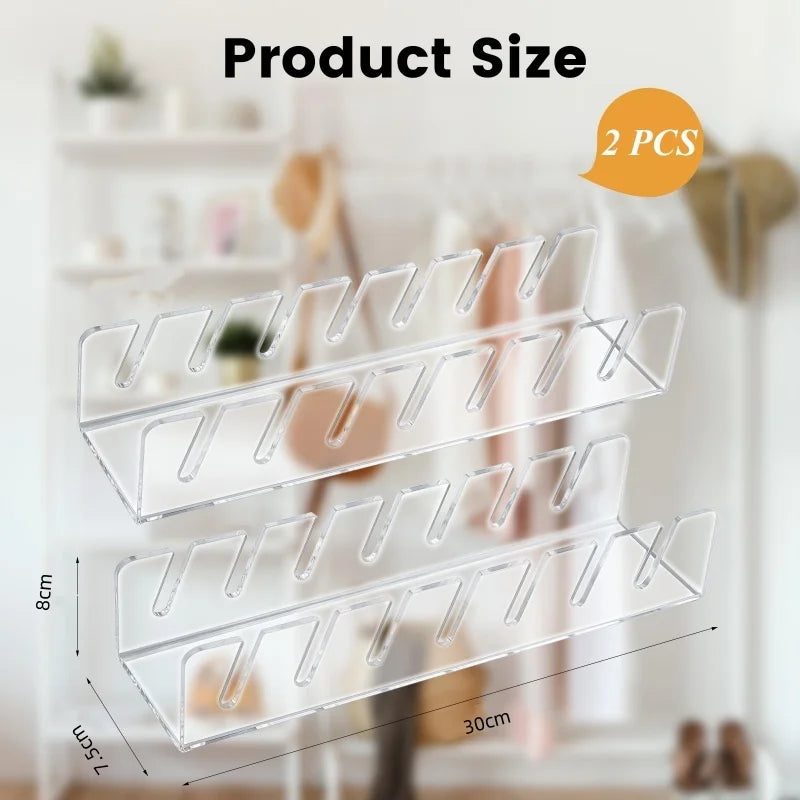 Two clear acrylic cap storage racks displayed against a white shelf.