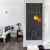 A framed chalkboard wall sticker featuring abstract lines and geometric shapes in yellow and red on a black background.